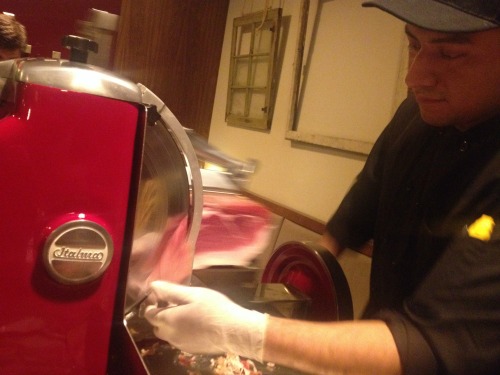 Prosciutto Sliced On The Machine